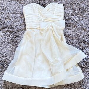 ABS Elegant Cream Strapless Tier Dress with Bow